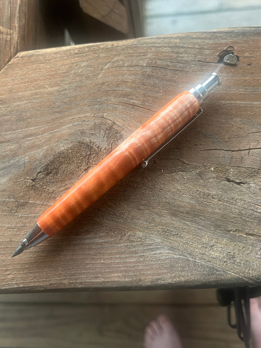 Dyed curly maple clutch holder